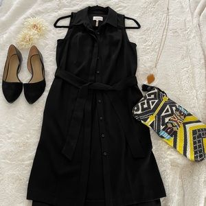 Sleeveless button down with belt dress.
